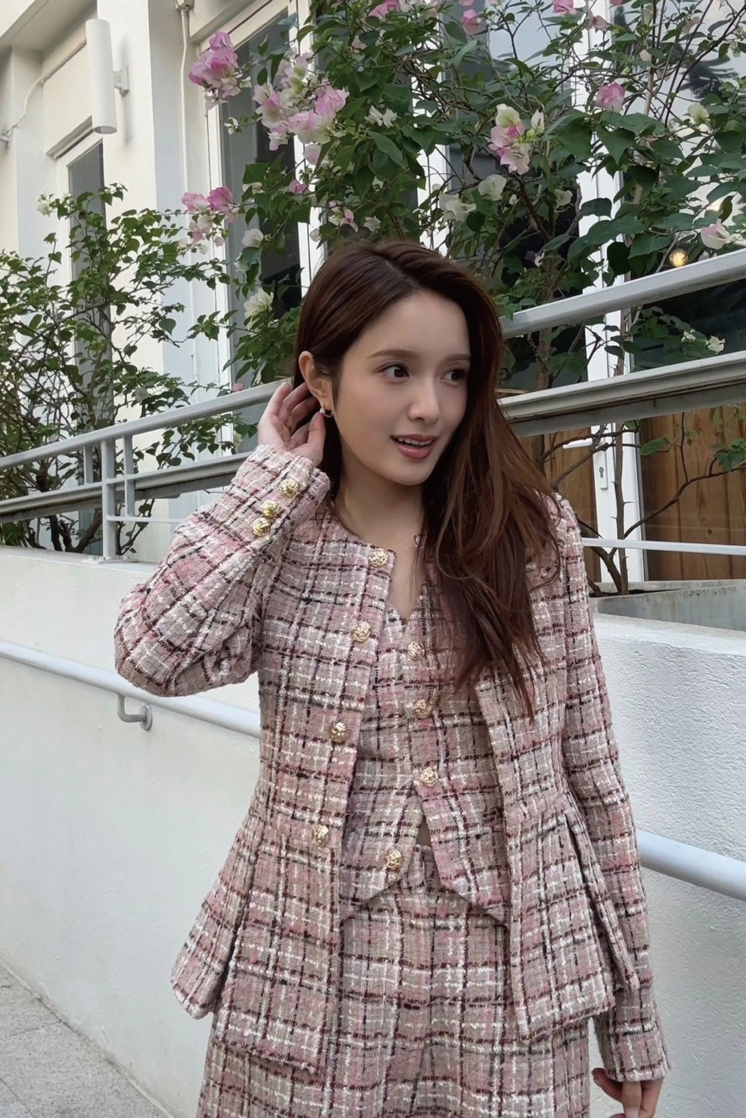 Feeling rosy in chic tweed jacket